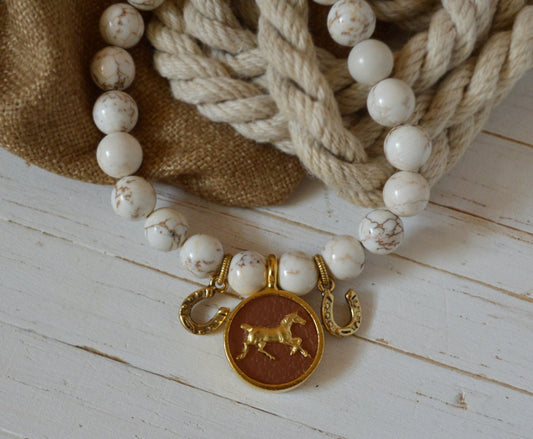 Beaded Bracelet with saddle leather & gold horse