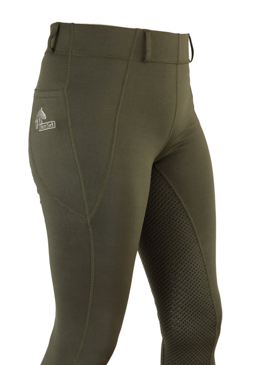 Green horse riding tights with logo, mesh side panels, close-up.