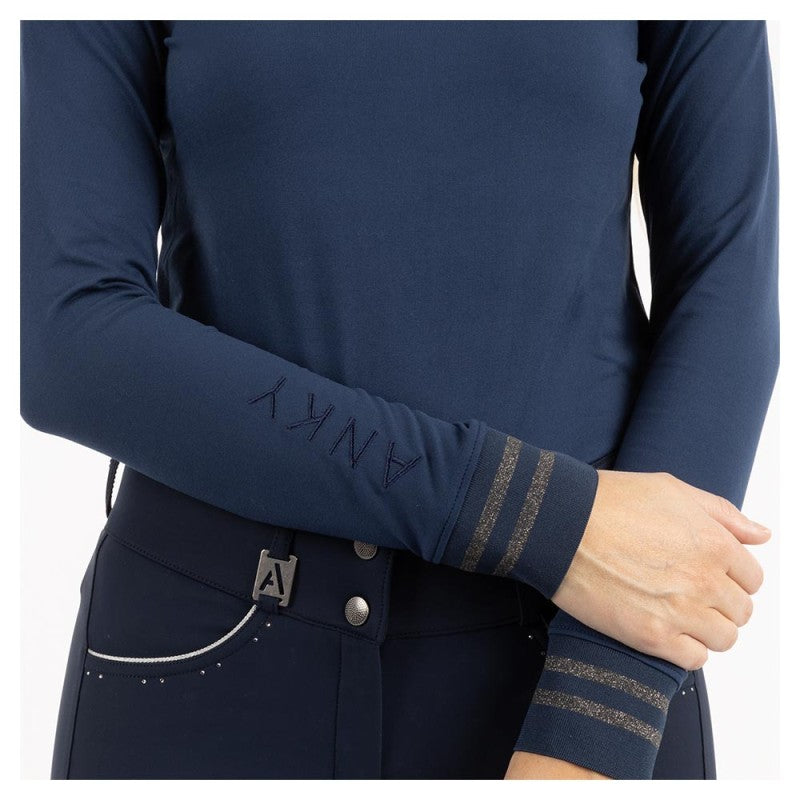 ANKY brand navy riding shirt with decorative arm stripes.