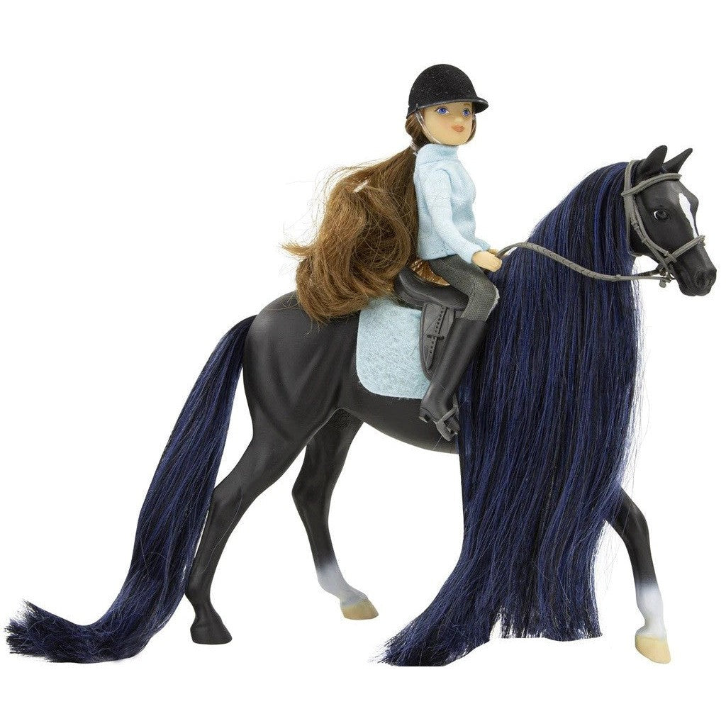 Breyer Horse Toys figurine with rider on black horse isolated.