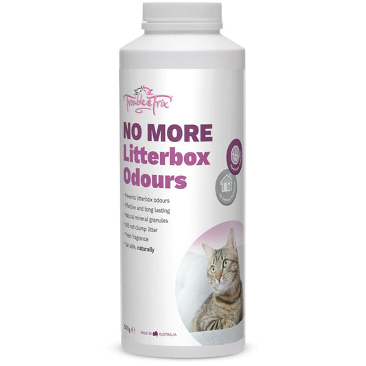 Trouble & Trix litterbox odour remover bottle with cat image.